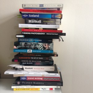 pile of books on a table